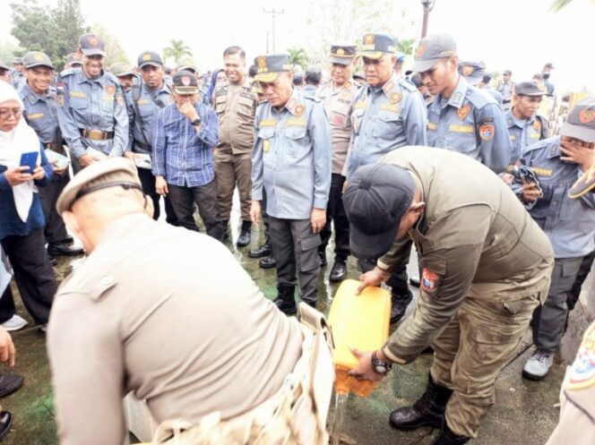 
					Apel Siaga : Satlinmas Jadi Perpanjangan tangan Pemkab Banggai Laut untuk Jaga Keamanan di Desa